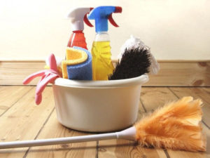 cleaning supplies in a bucket